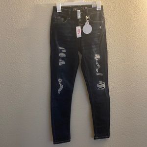 High rise jeggings. Three button, distressed skinny jeggings
